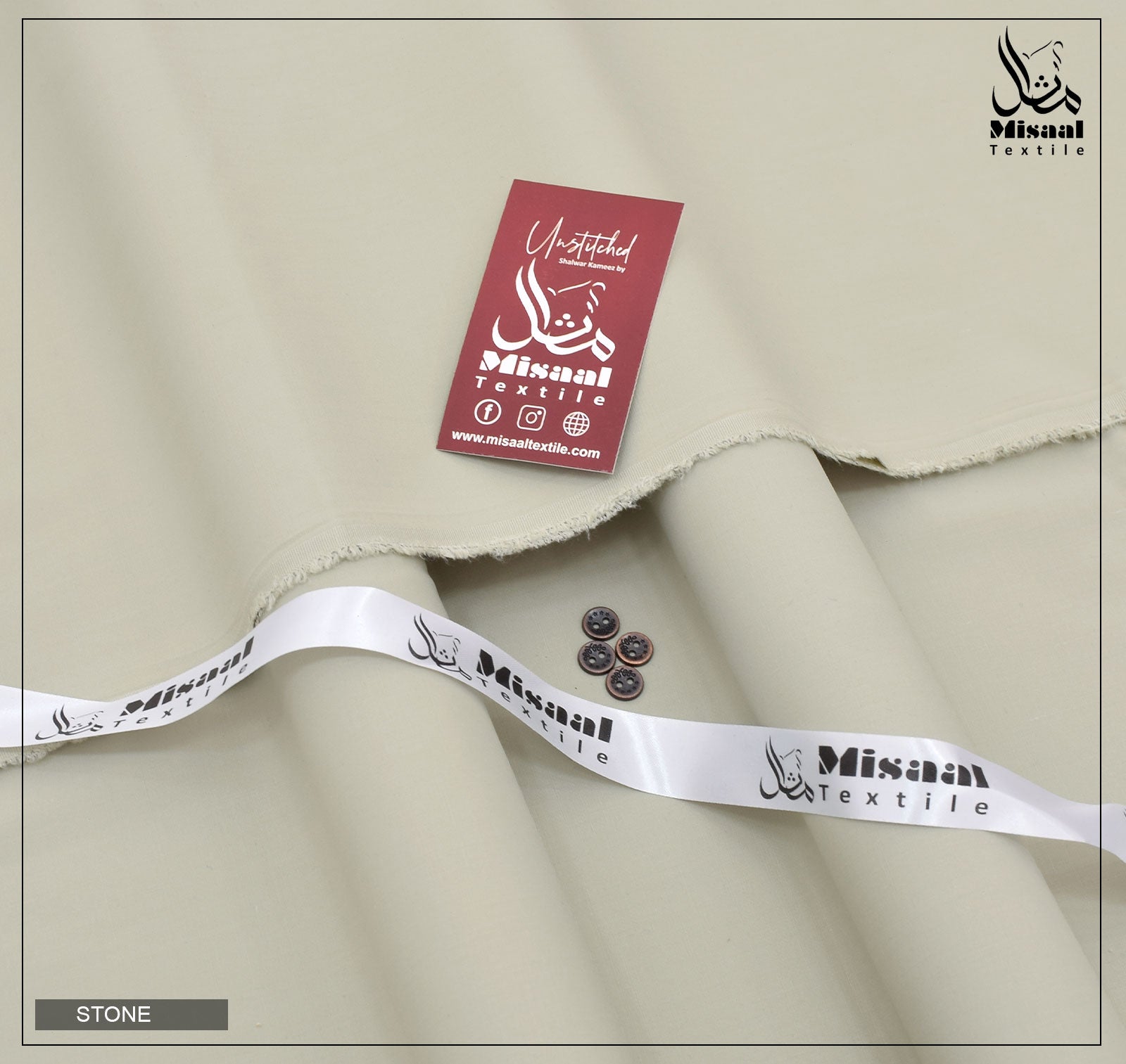 Textile sample with Misaal Textile branding on a neutral background