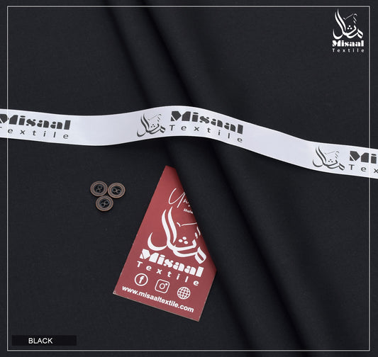 Misaal Textile ribbon and tag on black fabric background