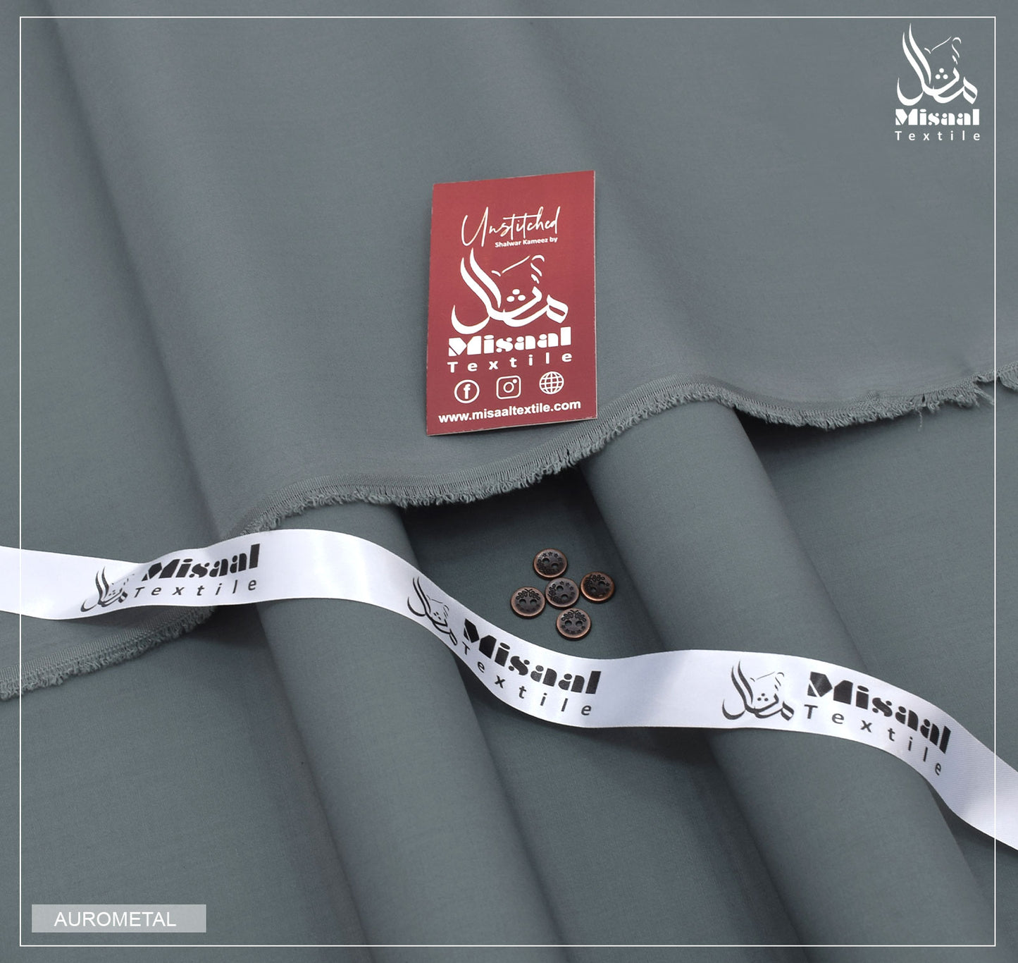 Gray fabric with 'Misal Textile' label and ribbon on a gray background