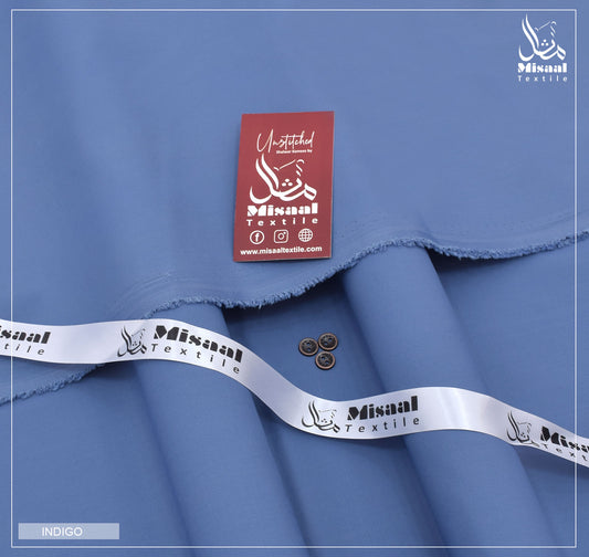 Blue fabric with Misaal Textile label and branding