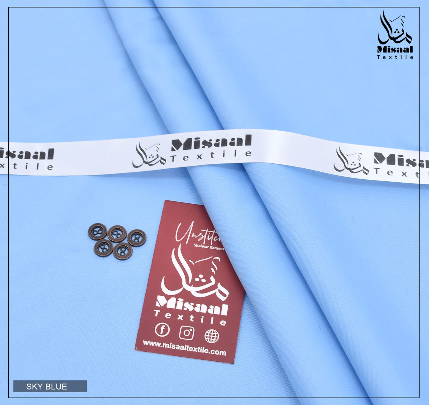 Misaal Textile fabric with a ribbon and tag on a blue background