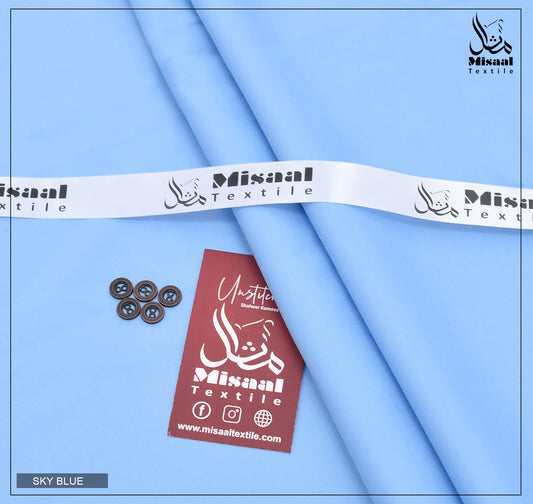 Misaal Textile fabric with a ribbon and tag on a blue background