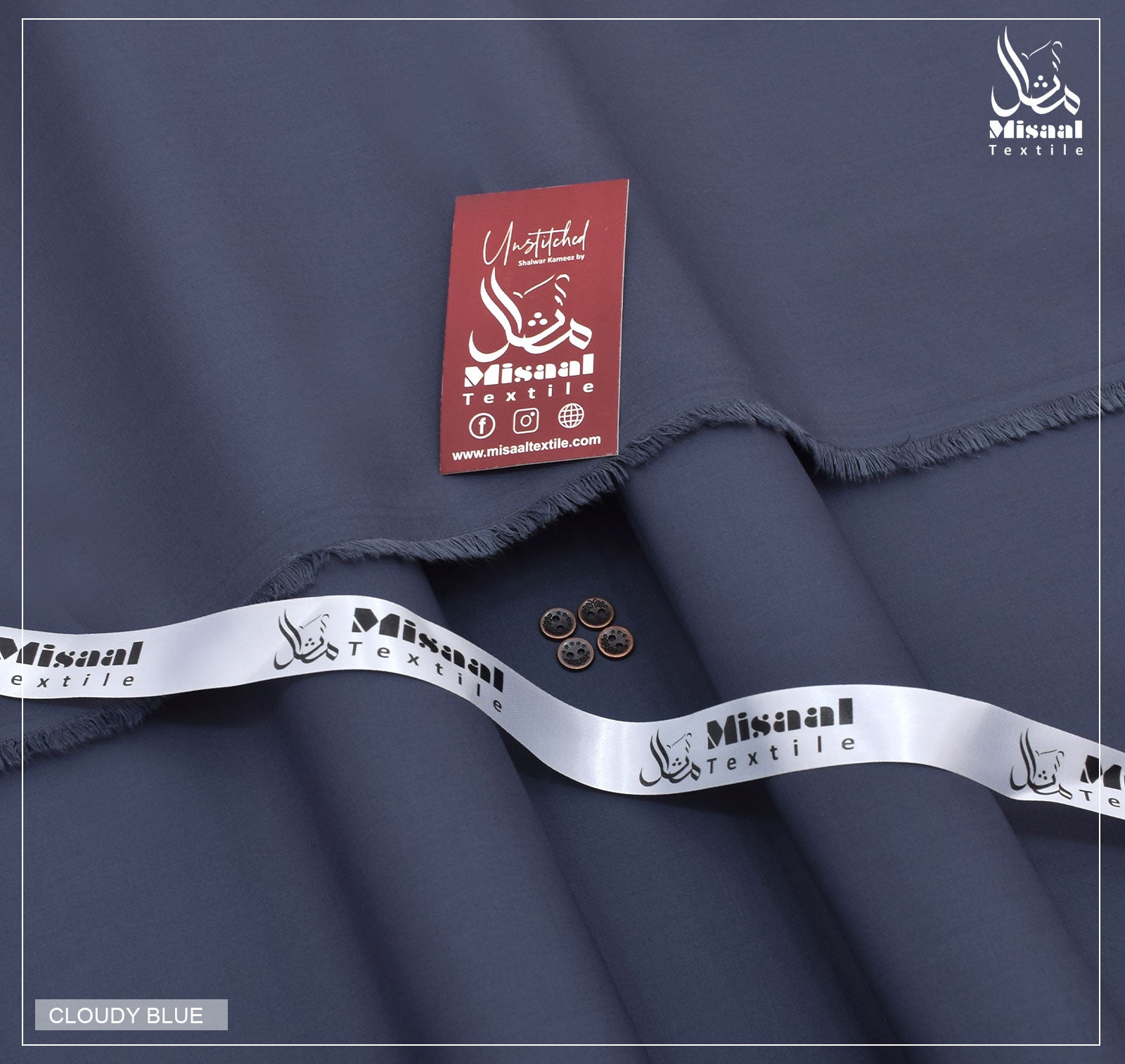 Navy blue fabric with Misaal Textile label and branding