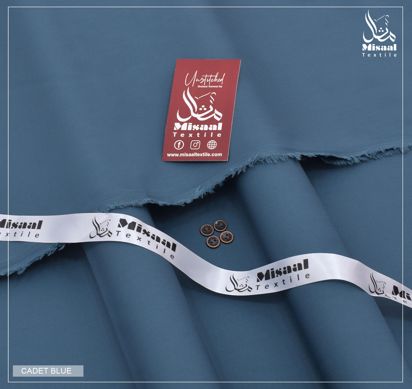 Blue fabric with Misaal Textile label and branding