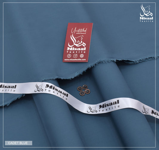 Blue fabric with Misaal Textile label and branding
